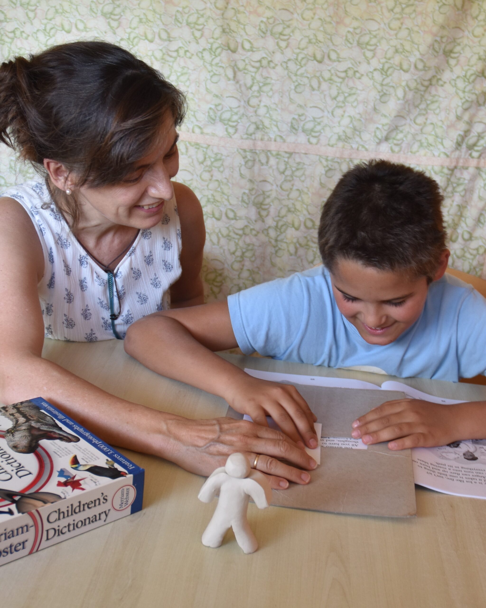 Dolores Gage and her son working together through the Davis program