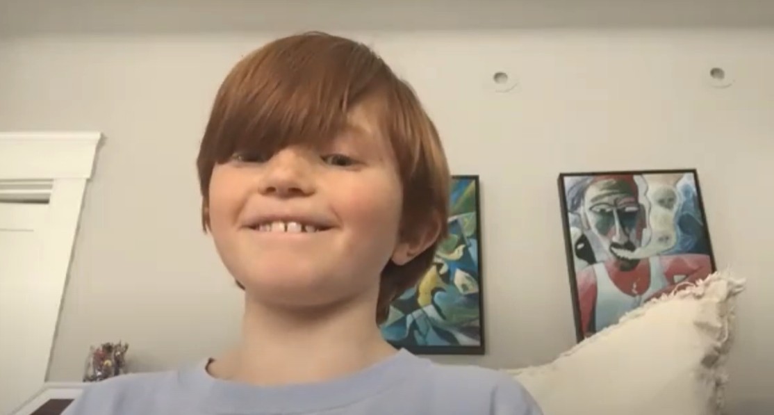 Alex, a young 12 year old boy, smiling